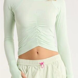 FREE PEOPLE MOVEMENT
Tempo Ruched Long Sleeve Pullover Top - Cactus